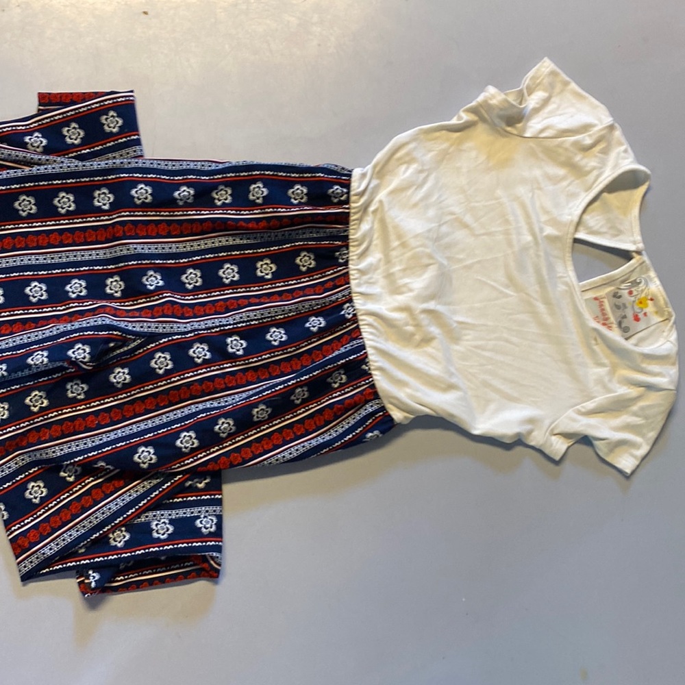 A 4th of July romper colors red white and blue
